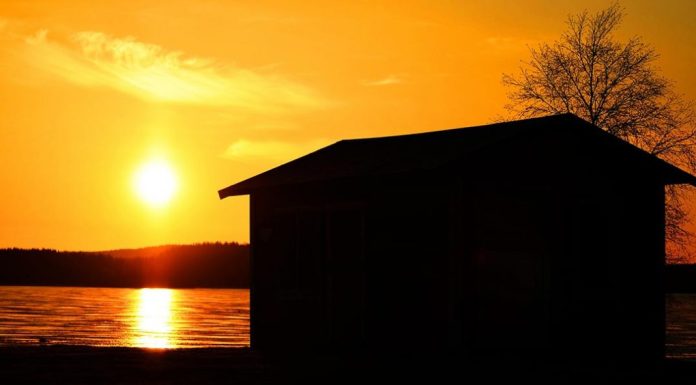 Solnedgång över Piteälven Solnedgång vid Piteälven, Sverige - Travel in Sweden